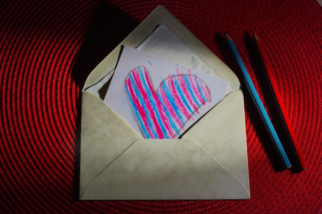 習い事の先生へのお礼の手紙子どもの絵とメッセージ、ハートのイラスト赤青